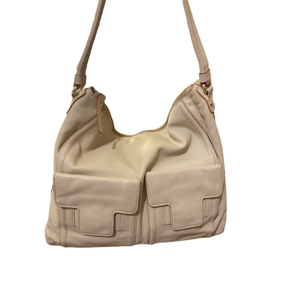 537 Kate Spade cream lamb skin 2 front pockets preowned